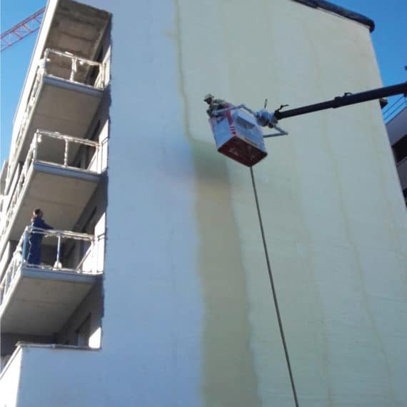 Medianera proyectando PUR